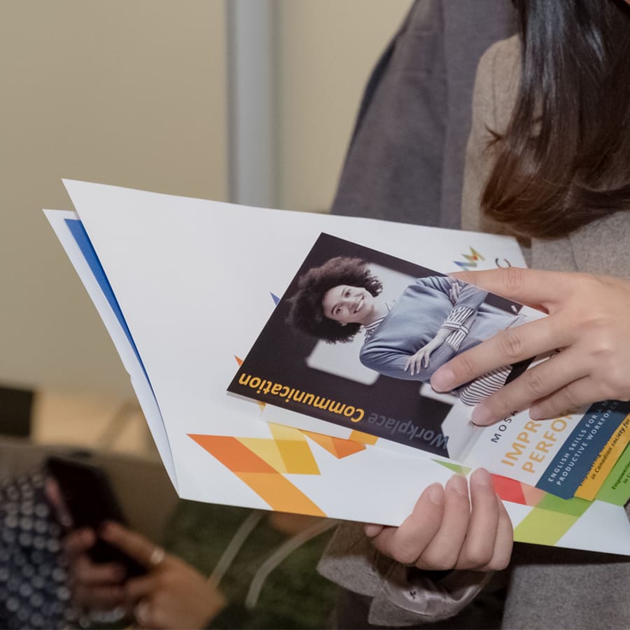 person holding up mosaic resources